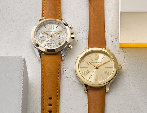 Two watches with brown leather bands